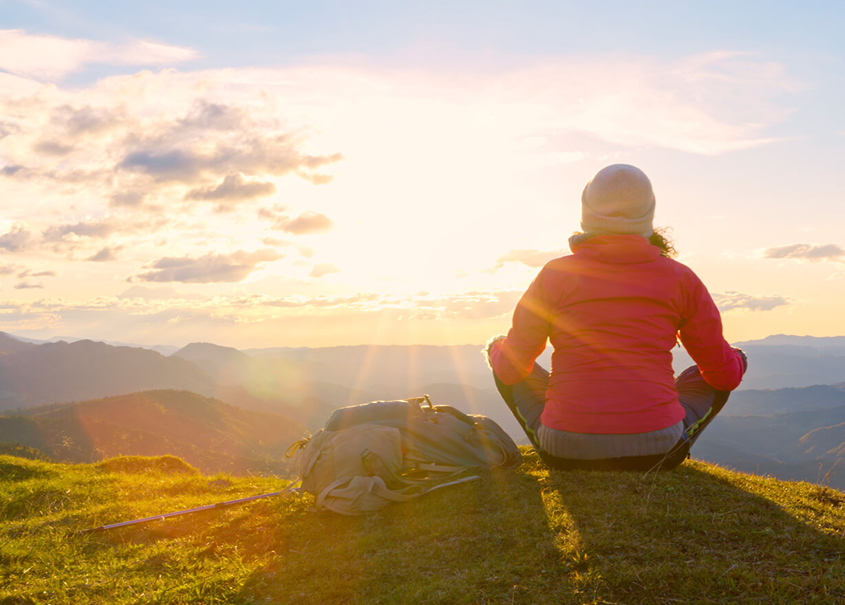 Lady watching sunrise