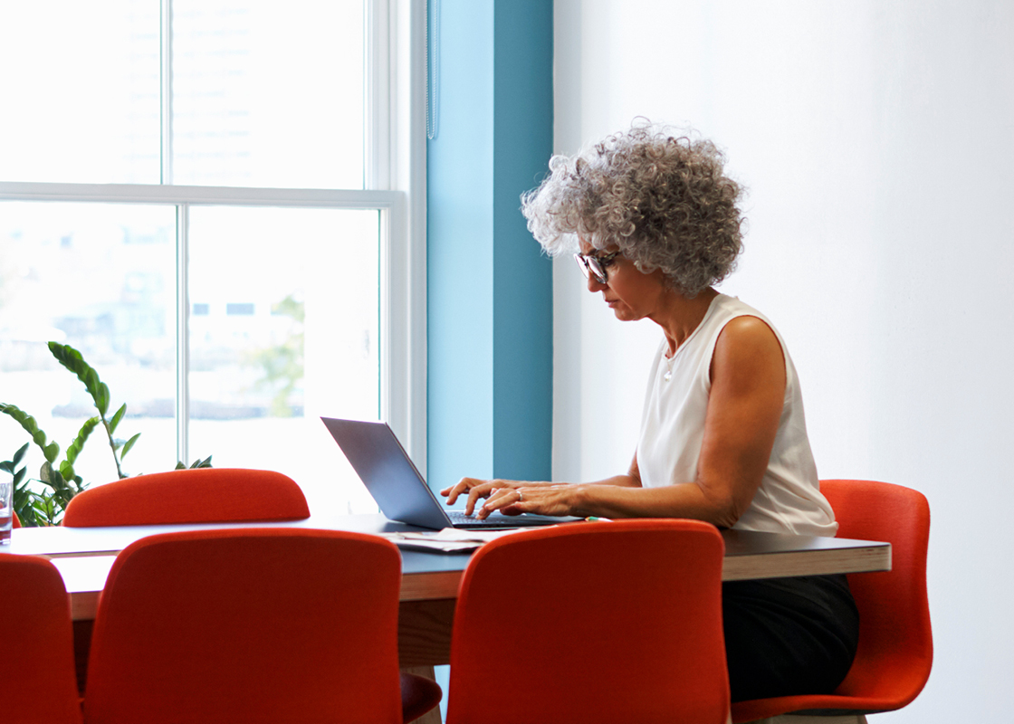 Adviser using laptop