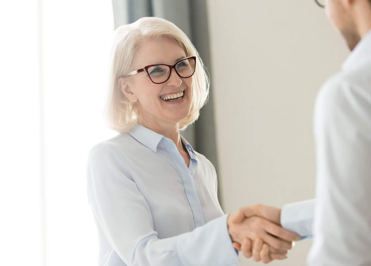 Female adviser shaking hands