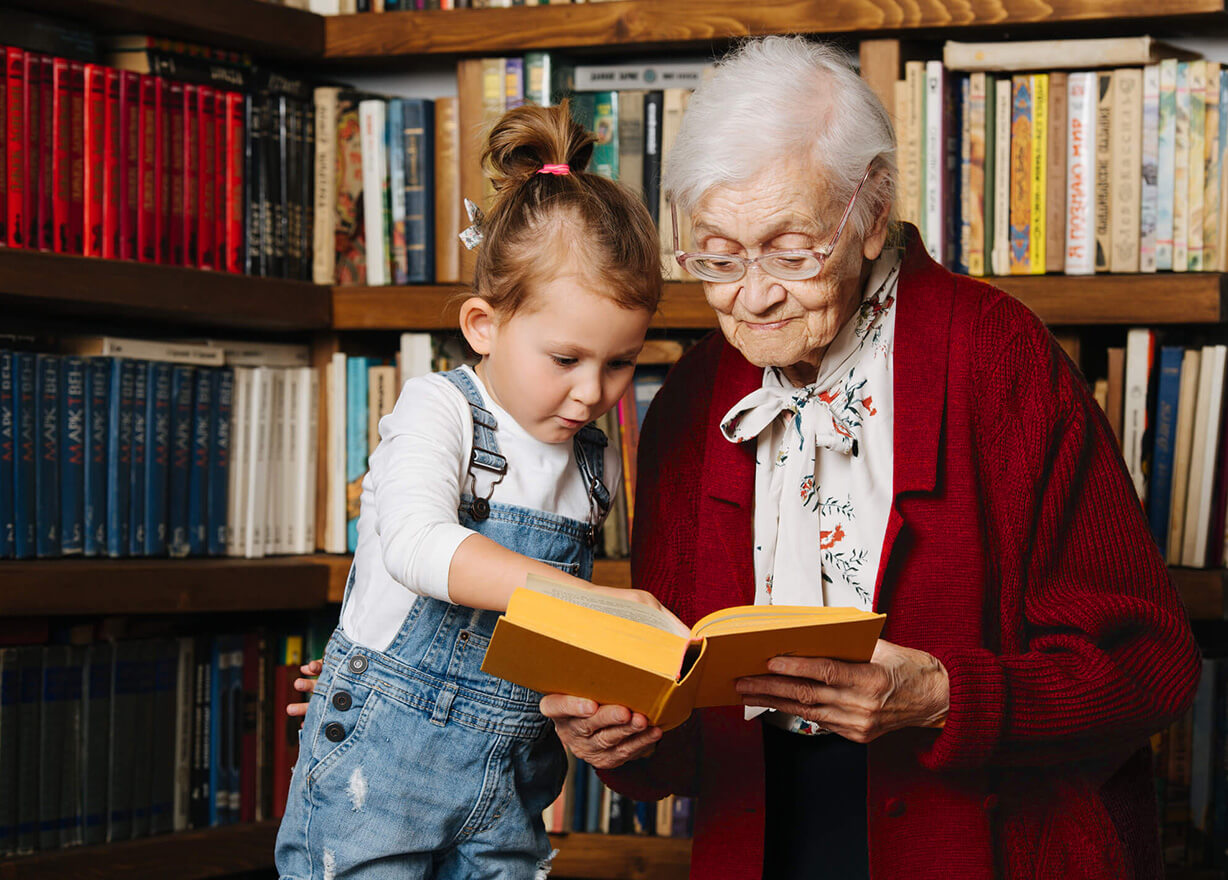 Elderly lady with grandchild