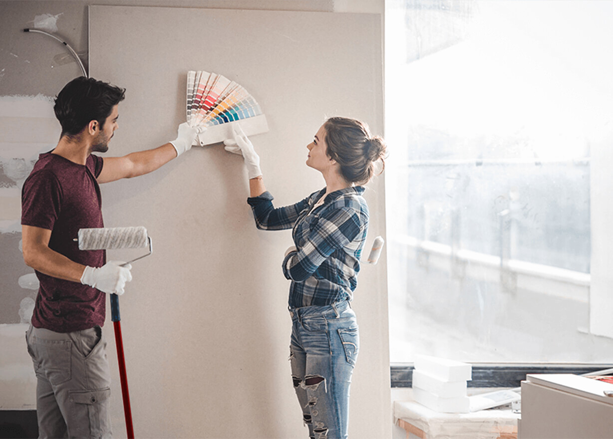 Couple decorating their new home