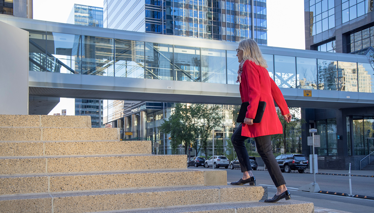 Lady walking up stairs