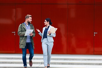 women and man walking