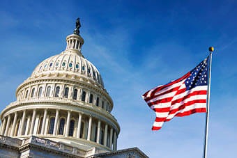 US Capitol with US flag