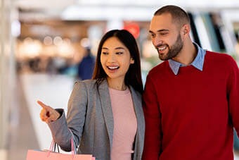 couple shopping in shopping centre