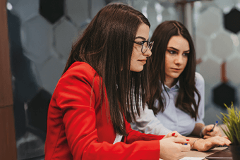 Women on laptop in office