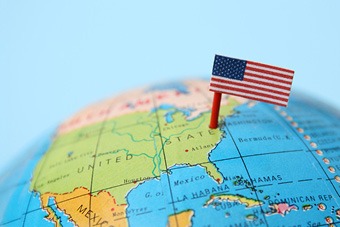 Globe with a US flag pinned to the USA 