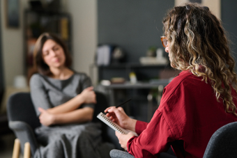 Two people in serious conversation