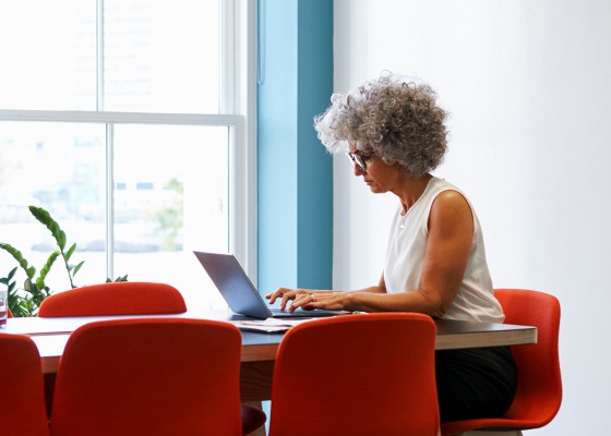 Adviser using laptop