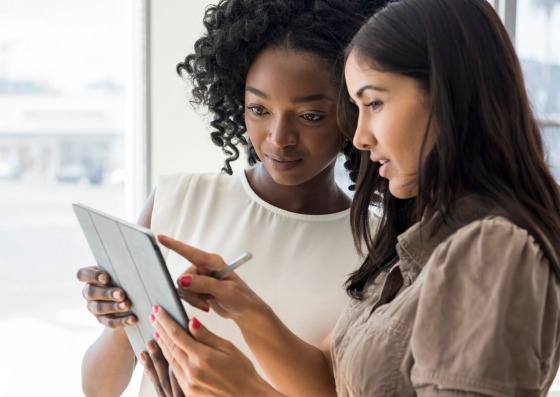 Females using tablet device