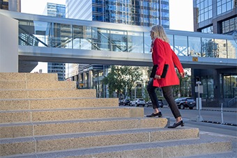 Woman walking up stairs