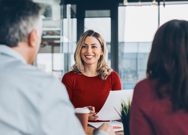 Female adviser with clients