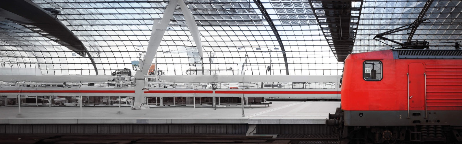 Red train entering station