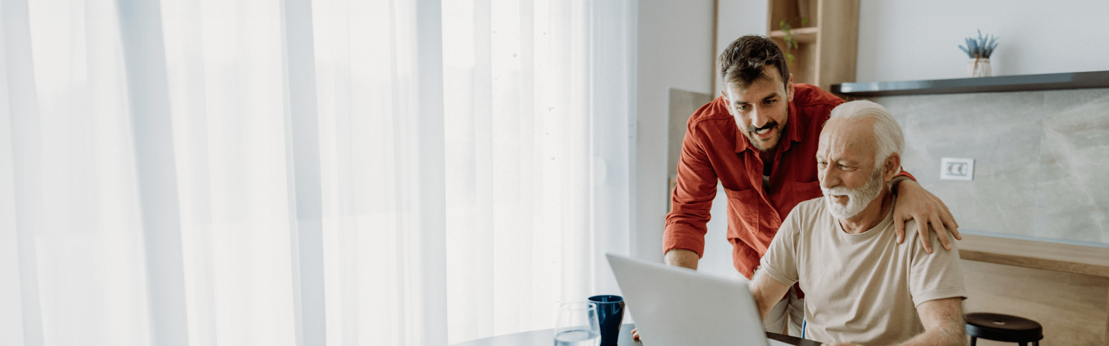 helping on the laptop