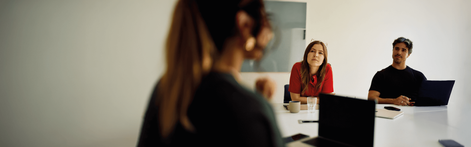 Three people having a business meeting
