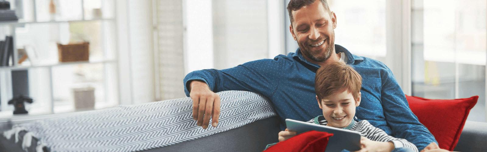 Father with son using tablet
