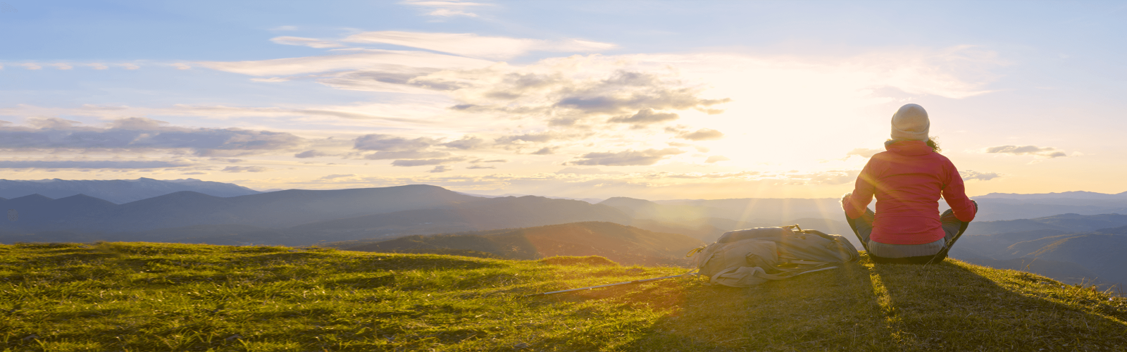 Hiker looking at sunrise