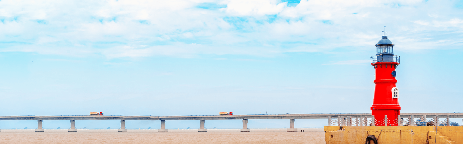 red lighthouse and beach