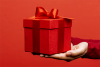 Red present box against red background